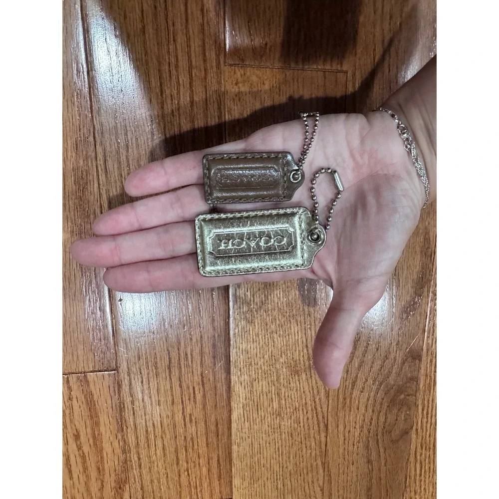 Lot of 2 Coach Leather Bag Charms Keychains Set Gold Brown Authentic‎